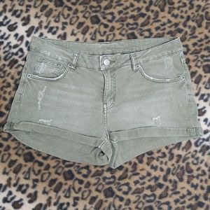 H&M distressed low rise, cuffed denim shirts